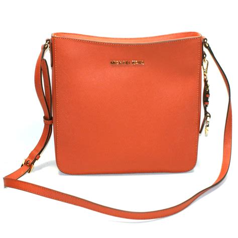 michael kors mini messenger bag orange|michael kors messenger bag men's.